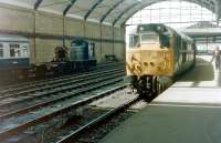 31171 stands at the platform at Newcastle Central in 1982 with station pilot 03021 in the background. <br><br>[Colin Alexander //1982]