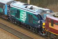 DRS 68002 <I>Intrepid</I> during a test run on 4 February 2014 passing Farington Curve Junction behind 90020 [see image 46188].<br><br>[John McIntyre 04/02/2014]