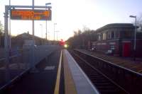 The 15.43 service to Basingstoke arriving at Templecombe 31 minutes down on 27th December 2013. The platform to the right (which once offered interchange with a spur from the S&D) is now only accessible between the hours of 06.00 and 11.00 on weekdays.<br><br>[Ken Strachan 27/12/2013]