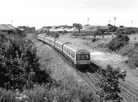 A pair of triple dmus heading back to Waverley from Meadowbank past Lochend South Junction on 29 July 1986 with a Commonwealth Games rehearsal special.<br><br>[Bill Roberton 29/07/1986]