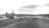 The view south at Roxburgh in 1966. The line to Kelso bears left, with the trackbed of the Jedburgh branch on the right [see image 22623].<br><br>[Bruce McCartney //1966]