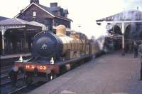 A BLS railtour from Glasgow at Dumfries on 17 October 1965 behind preserved ex-Highland Railway Jones Goods 4-6-0 no 103.<br><br>[G W Robin 17/10/1965]