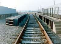 The bridge carrying the Waverley route over the West Coast Main Line at Kingmoor, seen here in 1981 looking back towards Carlisle. This surviving southern section of the line ran from Stainton, linking Kingmoor yard with a warehousing and distribution depot at Kingstown Industrial Estate, Brunthill. [See image 17097]<br><br>[Colin Alexander //1981]