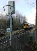 Passing through the site of Lower Darwen station (closed 1958) is a Clitheroe - Manchester service. All trace of the old station has been removed at rail level. Following a long campaign for re-doubling of the line a long loop was installed in the area of Darwen station in 2015. Elsewhere on the line bridges, such as the one in the foreground, and other infrastructure changes have precluded a second track being laid. [Ref query 7170]<br><br>[Mark Bartlett 07/02/2014]