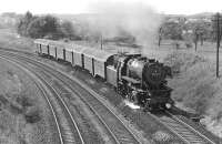 The 12:27 Crailsheim - Laude, seen here with 023 012 in charge on the eastern outskirts of the town in 1974. The single track on the right diverges from the double track of the Stuttgart to Nrnberg main line just behind the camera and heads north to Lauda, an important junction on the Stuttgart to Wrzburg line. <br><br>[Bill Jamieson 01/09/1974]