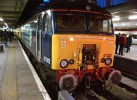 DRS 57302 <I>Chad Varah</I> succeeds in keeping a 350 away from the buffers at Euston on 7 February.<br><br>[Ken Strachan 07/02/2014]