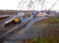 And then there were two [see image 42686]. DRS 37069 and 37714 relax at DIRFT between duties just before Christmas 2013.<br><br>[Ken Strachan 20/12/2013]