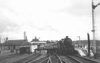 Recently arrived at Roxburgh on 14 April 1963 is B1 61324 with the SLS/BLS <I>Scottish Rambler no 2 (Joint Easter Railtour)</I>.<br><br>[Robin Barbour Collection (Courtesy Bruce McCartney) 14/04/1963]