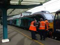 Platform meeting at Carlisle on 5 February between engineers and crew of new DRS class 68 loco 68002.  The test train had just arrived behind 47853 which was about to be replaced by 90020 for the second days test trip to Crewe. According to the driver these will continue for approximately 2 months before the loco enters normal operational service.<br><br>[Ken Browne 05/02/2014]