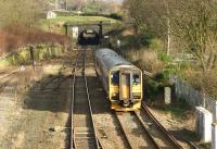 155345 has just crossed Hall Royd Junction as it heads west on the Calder Valley route to Manchester Victoria. The tracks on the left are the route over Copy Pit which on 10 February 2014 had not seen any trains for 2 months with the engineering work taking place on Holme Tunnel. Beyond the junction is the short 225 yard Millwood Tunnel.<br><br>[John McIntyre 10/02/2014]