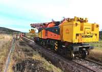 The Colas Crane doing a test run up to the Dulnain Bridge abutment on 14 February, before lifting the first girder.<br><br>[John Gray 14/02/2014]