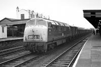 <I>Warship</I> class No. 831 <I>Monarch</I> seems a little out of place on an unfitted freight comprising mainly of loaded 16t mineral wagons which it is bringing along the up through road at Cardiff General on 14 March 1970. <br><br>[Bill Jamieson 14/03/1970]