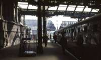 The BR (Scottish Region) <I>Grand Rail Tour no 5</I> stands in the shadows at Manchester Victoria on 1 June 1968 behind Britannia Pacific no 70013 <I>Oliver Cromwell</I>.<br><br>[John Robin 01/06/1968]