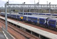 Class 334s in the sidings on the south side of Bathgate station on 22 February. <br><br>[Bill Roberton 22/02/2014]