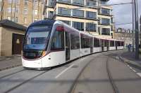 Edinburgh Tram 258 climbs Haymarket Yards during trial running on 25 February.<br><br>[Bill Roberton 25/02/2014]