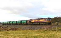 66100 heads north away from Beauly on 28 February with the tanker train for Lairg.<br><br>[John Gray 28/02/2014]