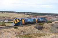 37606 and 37218 leave the south end of Culloden Viaduct on 28 February on their way back to Motherwell, with snowploughs at each end.<br><br>[John Gray 28/02/2014]