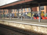 A trio of DRS class 20 locomotives (left to right are 20308, 20305 and 20312) stabled forward of Network Rail's new York Rail Operating Centre, built on the site of the former York South shed. They had been joined by DRS 66421 by early evening. [See image 38048]  <br><br>[David Pesterfield 28/02/2014]