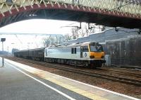 92010 <I>Moliere</I> held in the down station loop at Carstairs in March 2004 with a train of 'Ferrywagon' vehicles.<br><br>[John Furnevel 17/03/2004]