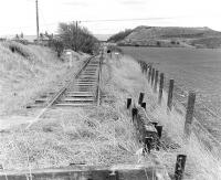 View south towards the Woolmet Colliery bing in the 1980s, with the 3'6 gauge railway laid for the Training Centre on the course of the standard gauge line which served the pit, closed on 2 September 1966.<br><br>[Bill Roberton //]