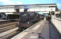 6911 <I>Holker Hall</I> calls at Beaconsfield on an August afternoon in 1964 with a Paddington - Banbury stopping train.<br><br>[John Robin 28/08/1964]