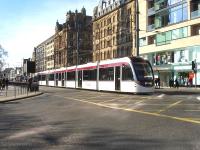Tram 272 runs past Waverley Bridge heading west along Princes Street after returning from York Place terminus during an early afternoon test run on 11 March.<br><br>[David Pesterfield 11/03/2014]