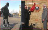 The statue of Harold Wilson seems to look on in approval at a ceremony taking place on 13 March at the Huddersfield  Water Tower, home of the Association of Community Rail Partnerships. Network Rail's Jerry Swift is in the process of unveiling the National Railway Heritage Award at the invitation of Awards Chairman, former ScotRail director John Ellis. [See news item]<br><br>[John Yellowlees 13/03/2014]