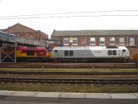 Former Wrexham & Shropshire Railway liveried 67015 was a long way off piste from its more usual route between Marylebone and Moor Street for Chiltern Railways, when noted at Doncaster on Thunderbird stand-by duty along with 67021 on 11 March 2014.<br><br>[David Pesterfield 11/03/2014]