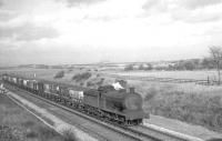 J27 0-6-0 no 65825 passing Little Benton South on the ECML with an up mineral train in January 1966.<br><br>[K A Gray 30/01/1966]