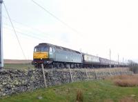 Steam substitute on Shap. D1755 northbound over Shap on 15 March 2014 with the <I>Cumbrian Ranger</I> from Tyseley to Carlisle. The diesel had taken over from the scheduled steam locomotive 4464 <I>Bittern</I> at Carnforth due to <I>'gauging issues'</I> with the A4. [See image 46643]<br><br>[Jim Peebles 15/03/2014]