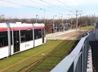 An Edinburgh tram heading for York Place arrives at Gyle Centre on 11 March during a testing / familiarisation run. Passenger services are due to get underway in May 2014.  <br><br>[John Furnevel 11/03/2014]