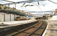 Looking back along platform 1 towards the concourse at Gourock station in August 2006. A train for Glasgow Central is awaiting its departure time at platform 3. <br><br>[Colin Miller /08/2006]