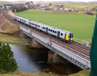 TransPennine 350402 from Manchester Airport to Glasgow Central crosses Crawford Viaduct on 17 March.<br><br>[Bill Roberton 17/03/2014]