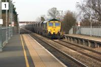 Freightliner 66545 passing through Ashchurch station on 8 March 2014 with Rugeley Power Station to Stoke Gifford empty coal wagons.<br><br>[John McIntyre 08/03/2014]