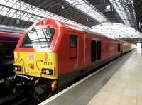 A gleaming 67027, resplendent in DBS livery, stands at the buffer stops at Queen Street on 17 March 2014 with the Network Rail Measurement Train.<br><br>[Mark Poustie 17/03/2014]