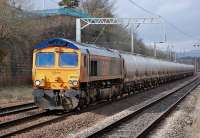 GBRf 66735 nears Coatbridge Central on 17 March with the 6E45 Fort William - North Blyth empty alumina tanks.<br><br>[Bill Roberton 17/03/2014]