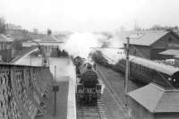 Black 5 44979 with empty stock from a football special at Muirend on 11 April 1964.<br><br>[John Robin 11/04/1964]