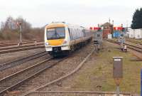 Chiltern Railways 168214 arrives at Banbury on 6 March 2014 with the 14.05 London Marylebone - Birmingham Moor Street. Banbury South signal box is on the right framed by a pair of 21st Century semaphore signals.<br>
 <br><br>[John McIntyre 06/03/2014]