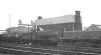 Sunderland based J27 0-6-0 no 65872 brings an up train of mineral wagons off the High Level Bridge and along the south side of Newcastle Central on the goods lines in May 1966.<br><br>[K A Gray 07/05/1966]