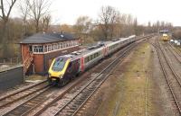 The 11.46 Southampton Central - Newcastle Central CrossCountry Voyager heads north from Banbury on 6 March 2014. Banbury North signal box stands on the left.<br><br>[John McIntyre 06/03/2014]