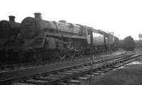 Locomotives stabled in the shed yard at Corkerhill on a grey afternoon in the autumn of 1963. Nearest the camera is standard class 5 4-6-0 no 73006.<br><br>[K A Gray //1963]