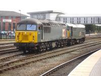 56303 propels 31452, both part of the DCR loco fleet, onto a stabling line on the east side of Derby station on 20 March 2014.<br><br>[David Pesterfield 20/03/2014]