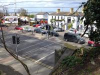 General view towards Howth Station in March 2014, now largely occupied by <I>The Bloody Stream</I> bar and restaurant.  Of further interest are the abutments left background and right foreground of a bridge which carried the Hill of Howth Tramway to its terminus.  Opened in June 1901 and closed on 31 May 1959.<br><br>[Bill Roberton 21/03/2014]