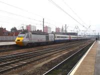 43300 <I>Craigentinny</I> is on the rear of this East Midlands liveried / East Coast branded HST set, as it leaves Doncaster on 28 February with the 09.54 departure to Kings Cross, ex Edinburgh.<br><br>[David Pesterfield 28/02/2014]