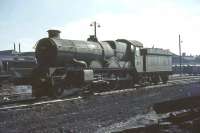7029 <I>Clun Castle</I> stands in the sunshine at Old Oak Common shed in the summer of 1964. <br><br>[John Robin 25/08/1964]