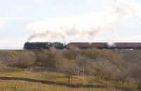 With the regulator open after crossing Ribblehead viaduct, 46115 <I>Scots Guardsman</I> approaches Blea Moor on 29 March 2014 with a charter from Leicester to Carlisle.<br><br>[John McIntyre 29/03/2014]