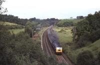 A Brush Type 4 descends towards Dunblane with a train in 1980.<br><br>[John Robin //1980]