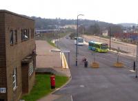 Effective transport interchange: looking South from the steps leading to Luton station footbridge, a down EMU approaches the platforms on the left. The green bus is about to take the guided busway to Dunstable; while the white coach is headed for Birmingham. The goods yard has gone, and the GNR Trackbed to Hatfield (right) [see image 27049] is no longer even used as a car park; but you cant make an omelette without breaking eggs.<br><br>[Ken Strachan 28/03/2014]