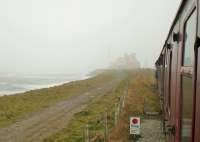 Peering through a North Sea <I>Fret</I> towards the aluminium terminal at North Blyth from <I>The Wansbeck</I> 2014 steam tour which ran to the limit of Network Rail metals on this branch. B1 61264 was leading the train at this point with K1 62005 on the rear. <br><br>[Malcolm Chattwood 29/03/2014]