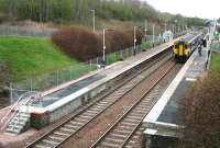 165514 at Carmyle on 2 April 2014 with the 08.52 service to Glasgow Central. The week long closure of the Whifflet line at the end of March resulted in platform ramps being replaced by gated steps at Carmyle and several other stations. [see image 41632].<br><br>[Colin McDonald 02/04/2014]